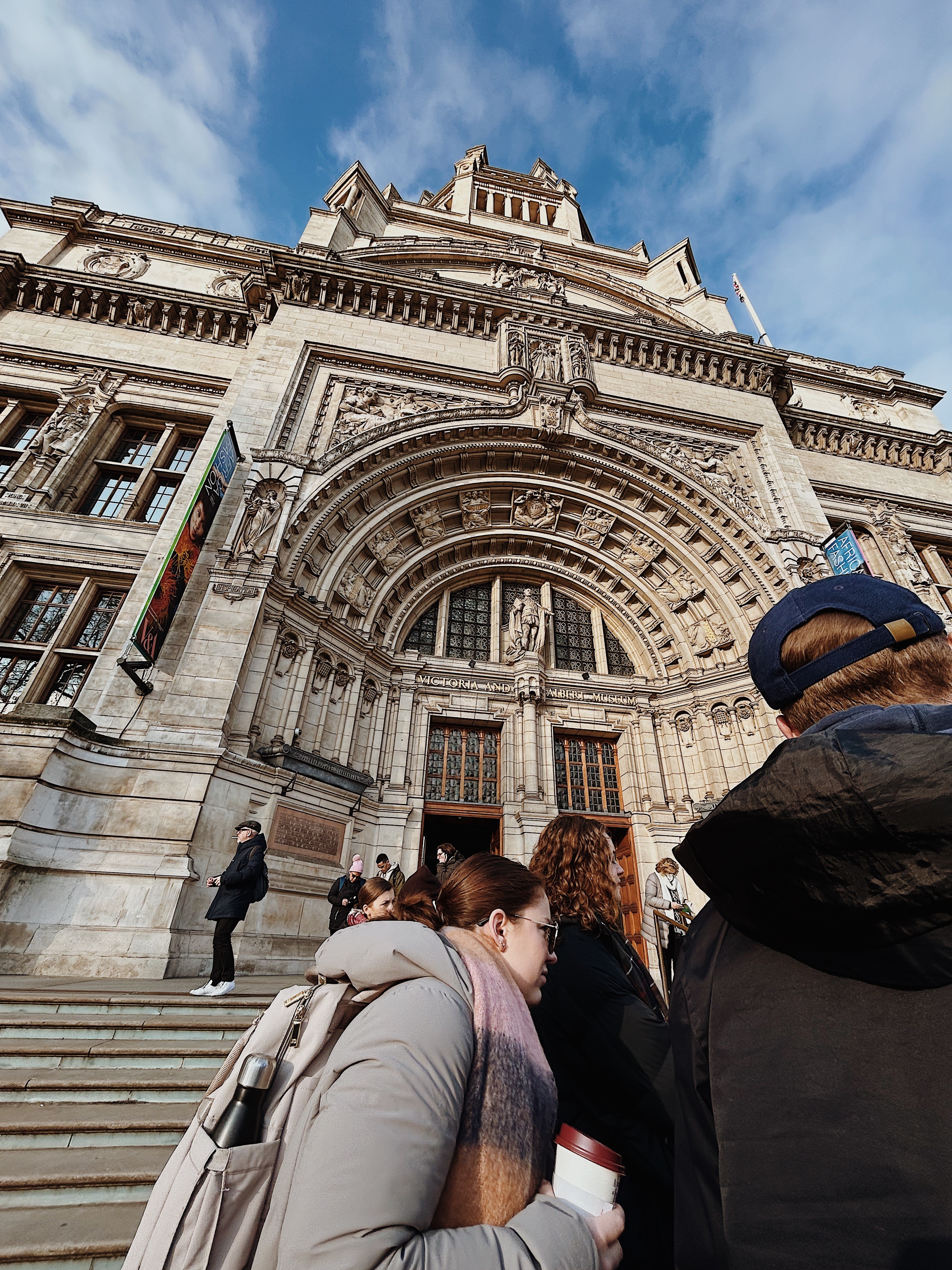 students on stairs at museum