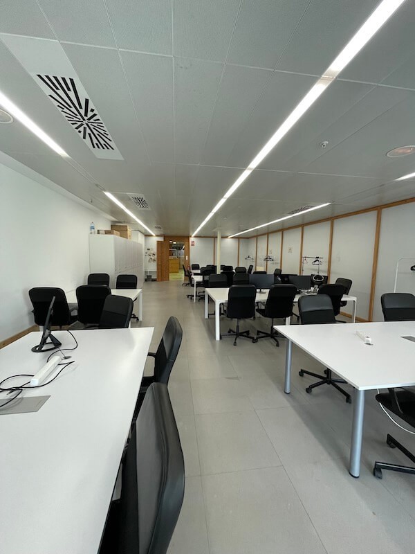 Tables and chairs at a coworking space