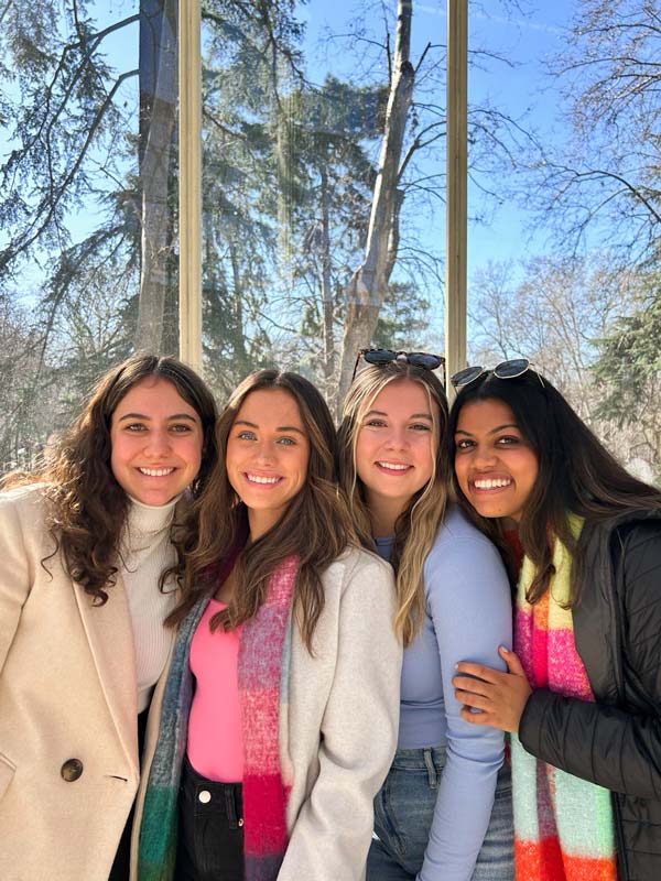 My roommates and I in the Palacio de Cristal in Madrid Group picture of 4 friends outside