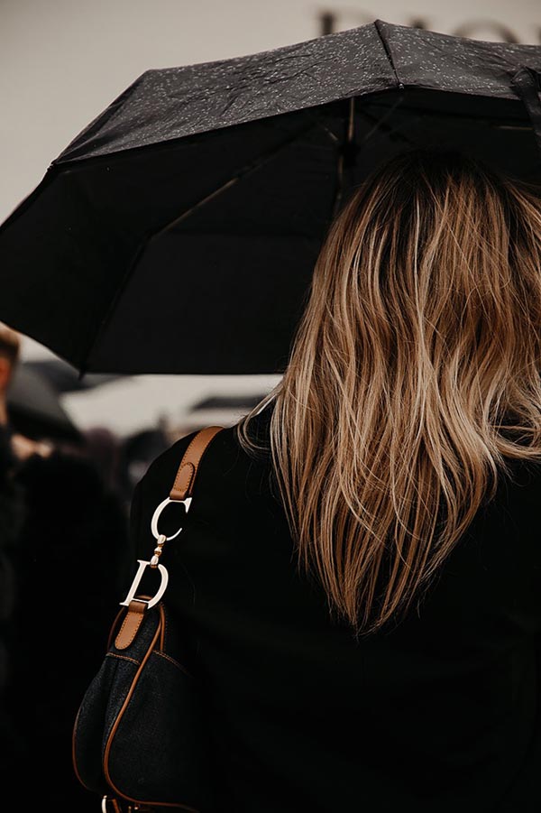 Black Christian Dior Saddle Bag at Paris Fashion Week 2022