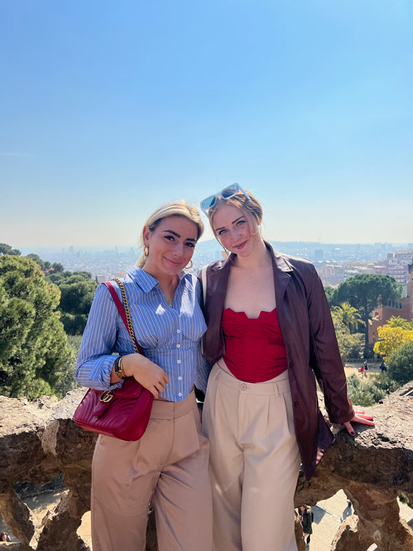 two friends smiling in nature