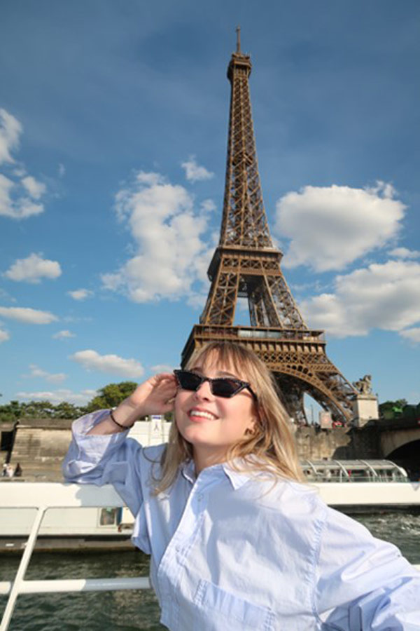 Student under Eiffel Tower