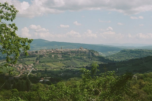 Rolling green hills, dark sky in Orvieto, Italy