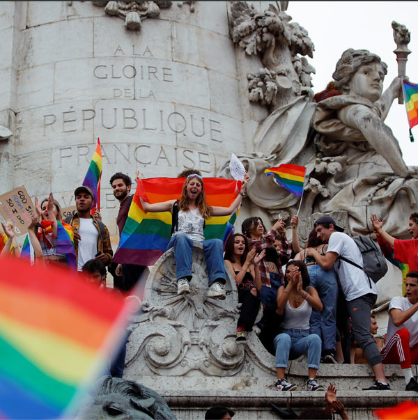 Pride-goers claim the statue de la liberte in republique
