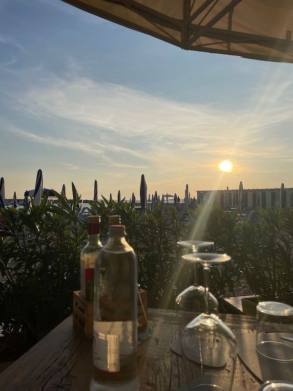 Sunset view from a restaurant table outdoors.