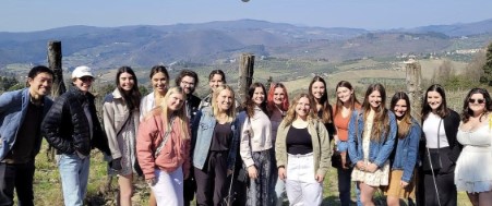 Class photo at a Tuscan villa tasting olive oil and wine